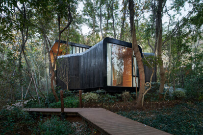 Monoarchi design four twisting cabins shaped by their surroundings
