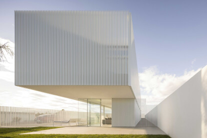 Piera House by Fran Silvestre Architects celebrates transparency with a veil-like lattice