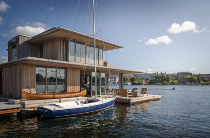 Floating home by Olson Kundig takes on a cabin sensibility in the heart of Seattle