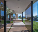 Laurel Way Beverly Hills luxury home modern glass wall walkway