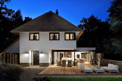 Modern villa with thatched roof