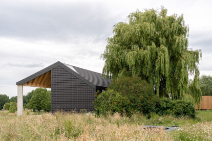 Under the Willow Tree provides residents an ecologically-minded house in a beautiful green setting