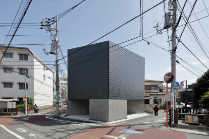 S Design Farm enfolds the Murakoshi House in a metal-panelled volume devoid of windows