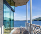 The deck and large expanses of glass emphasize the striking beauty of the island's waterways.