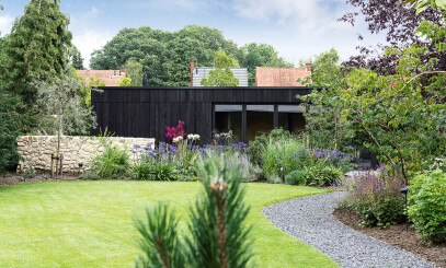 CHARRED TIMBER CLADDING HOUSE AND OUTBUILDING