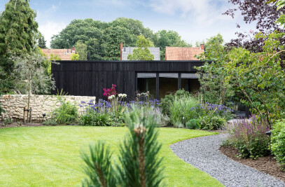 CHARRED TIMBER CLADDING HOUSE AND OUTBUILDING