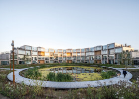 BIG designs spiral-shaped modular housing as a part of the master plan of NYE, Denmark