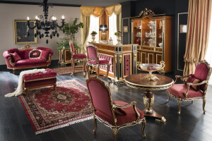 Two seater red velvet sofa with baroque heading by Modenese Interiors