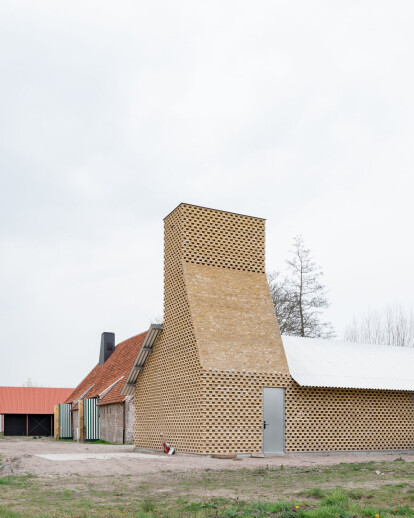 Multi-purpose Huys features a sculptural chimney along with a modern interpretation of Belgium moat farm typology