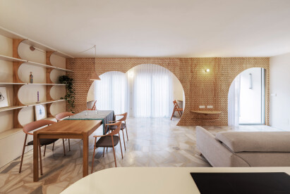 Laura Ortin Architecture adds perforated “celosia” as a dynamic element to this apartment in Spain