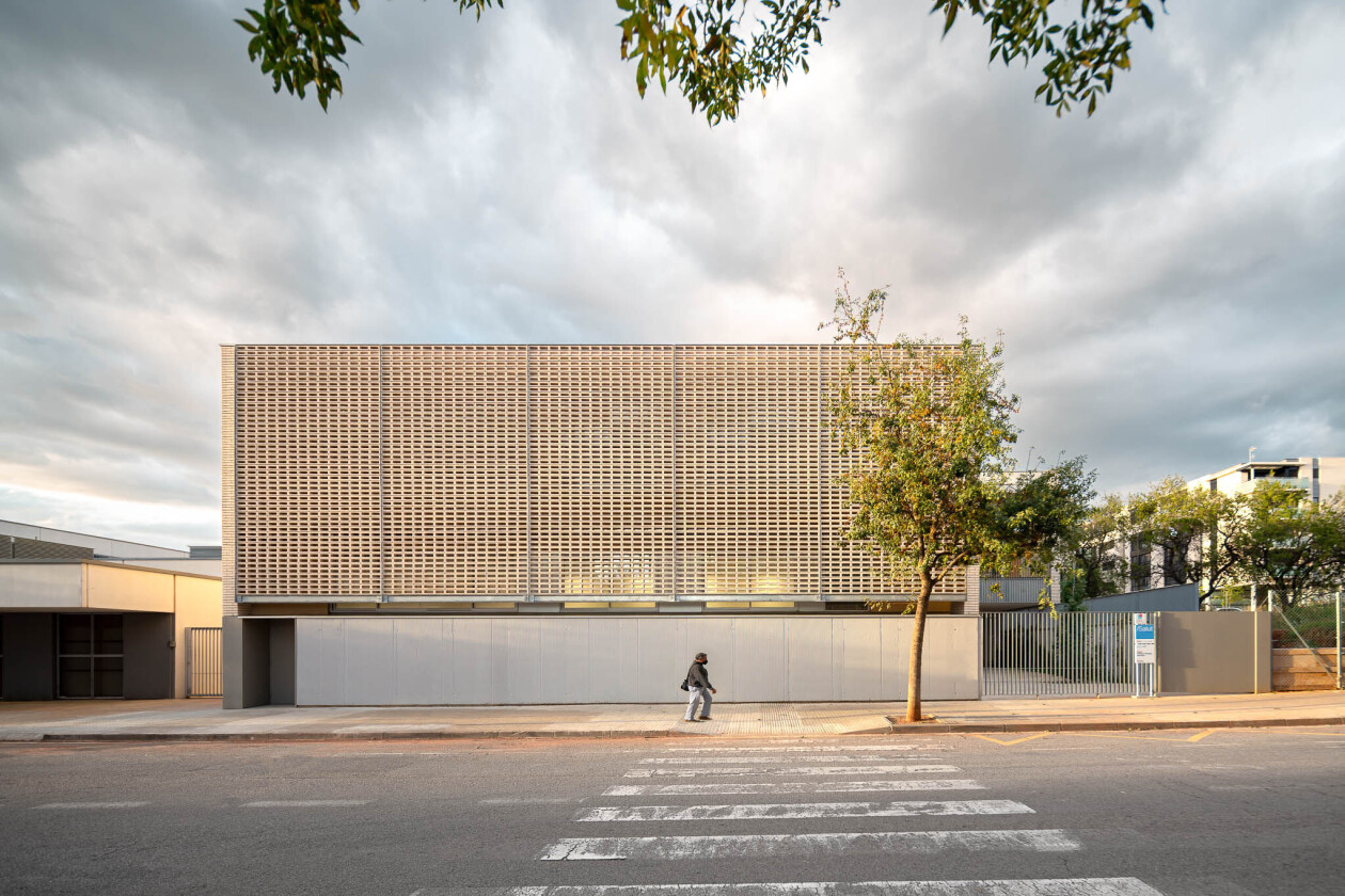 Forgas Arquitectes bring a friendly image to a Spanish healthcare facility with a custom ceramic facade design