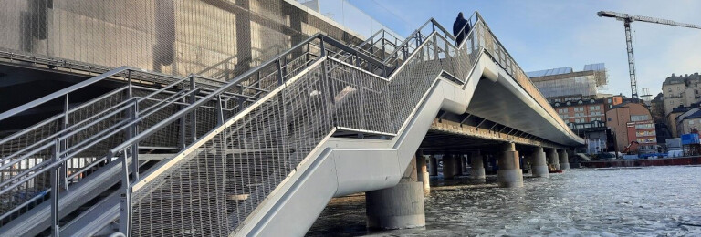 Cladding of train, bicycle and pedestrian bridge in Stockholm