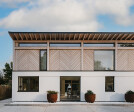 A visually robust form at ground floor with a more lightweight elegant timber structure above