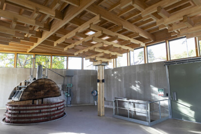 A low-carbon wine press and wine tourism room reflect a winemaker’s biodynamic methods