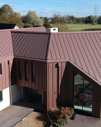 Red zinc clad demonstration house