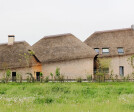 East facade cladd in thatch