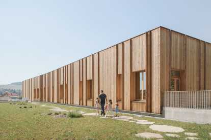 A nursery school by Rue Royale Architectes embraces both architecture and landscape