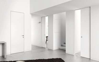 Flush-to-wall solutions for pocket doors, hinged door frames, access panels and skirting boards