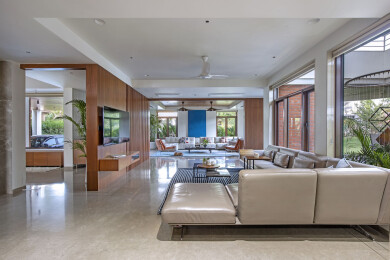 There is a seamless flow between the living room, family seating area, and dining area. The open floor plan creates a welcoming atmosphere and makes it easier to move between the spaces.