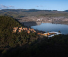 View of campus situated in national park landscape, looking northeast from main hiking trail to Shaxi  Five View of campus in national park landscape looking northwest across reservoir toward historic village of Shilong