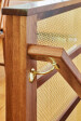 Banker Wire P-286 Brass woven wire mesh used in a space dividing stairwell