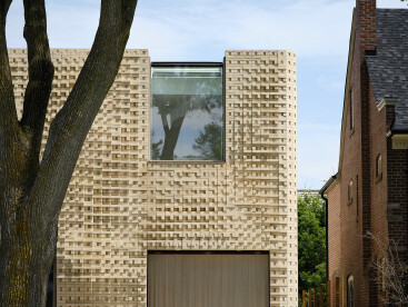 Canvas House explores the resonant form of brick with an innovative undulating facade