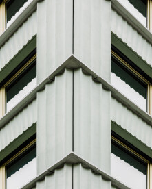 Detail: Harry Gugger Studio clads Medisuisse Headquarters in fluted GFRC panels