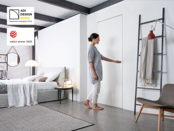 Splayed door frame for flush-to-wall swing door - Red Dot Design Award winner and ADI Design Index member
