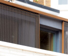 Banker Wire brass metal mesh for outdoor panels for residential use.