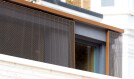 Banker Wire brass metal mesh for outdoor panels for residential use.