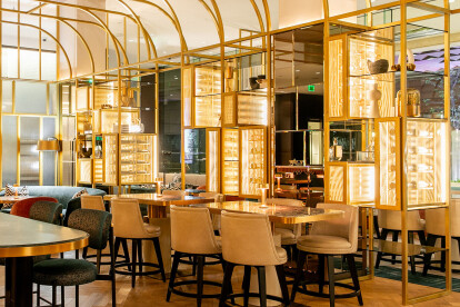 Banker Wire SPZ-52 in Plated Satin Brass featured in the Astra restaurant interior design in San Francisco