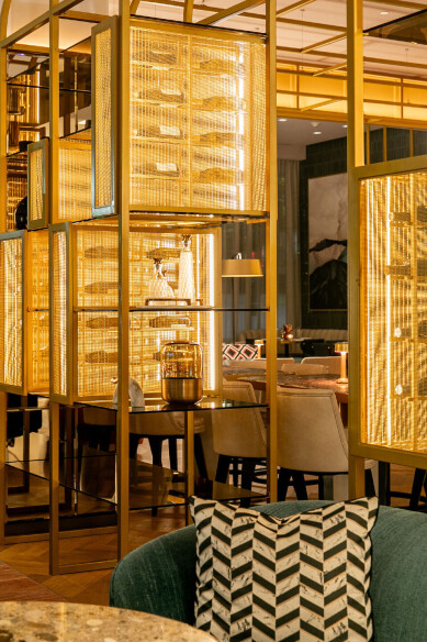 Banker Wire SPZ-52 in Plated Satin Brass featured in the Astra restaurant interior design in San Francisco