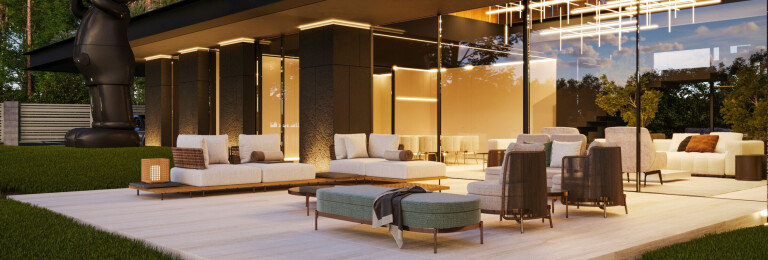 The living area with the outdoor terrace is lit in warm light