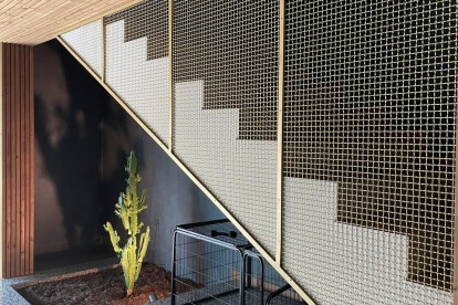 S-40 Woven Wire Mesh in Plated Satin Brass for Staircase Space Divider