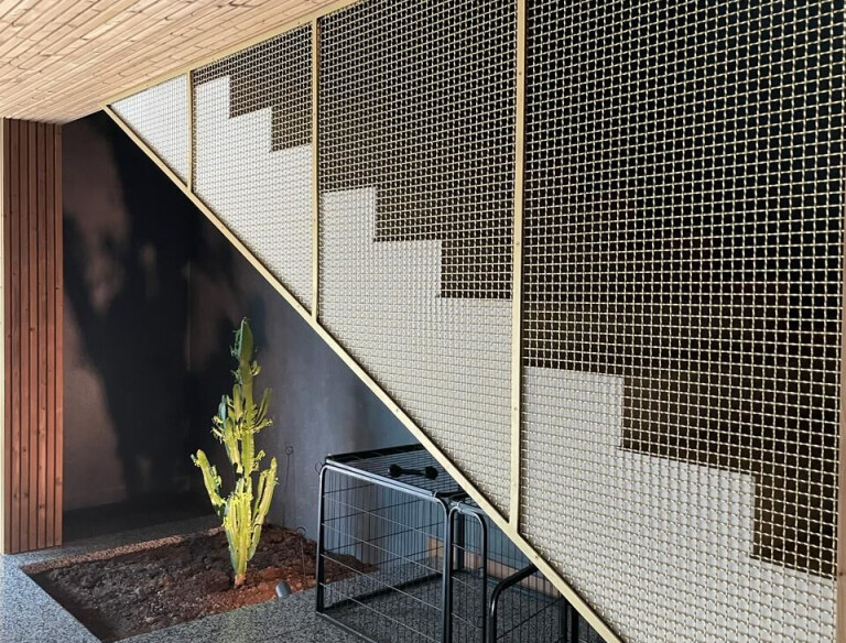 S-40 Woven Wire Mesh in Plated Satin Brass for Staircase Space Divider