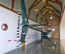 Helicopter Carriage House with Wood Clad Schweiss Hydraulic Door