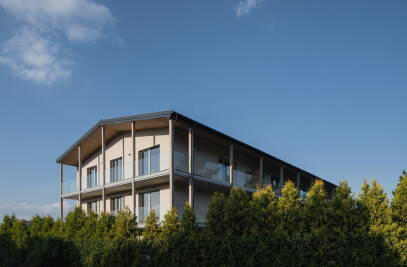 Apartment Building at the Foot of the Hill