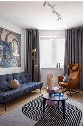 Painting above the sofa in the living room: “Rite of initiation” Ekaterina Pashkevich Sofa: Innovation living Carpet: Carpet Decor Armchair: TWILS (VENETA CUSCINI) Tables: HAY and RelictWood Floor lamp: Axolight