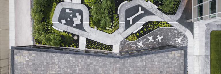 Paths meander across the intimate and relaxing pocket park.