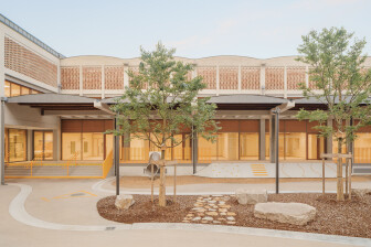 Vurpas Architectes converts former brick and concrete market into light-filled primary school in Lyon