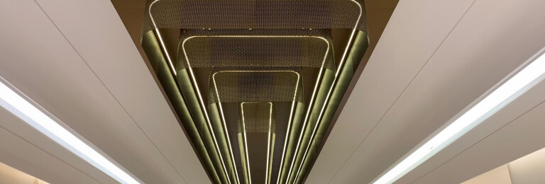TW-1 Woven Wire Mesh in Antique Brass installed as a Ceiling Feature