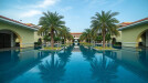The vast reflecting pool at the entrance provides a stunning panorama of the pool area the golf course