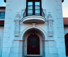 Stunning home entry. Exterior design details. Baroque balcony.
