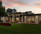 Modern home exterior architecture. Patio, fire pit, water feature, outdoor living space.
