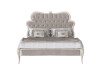 Exquisite Queen-Sized Bed with Tufted Velvet Headboard and Elegant Details