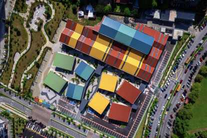 Aerial View of SAMA Square showing Vibrantly Colored Retail and Market Spaces Uniting Under One Roof.