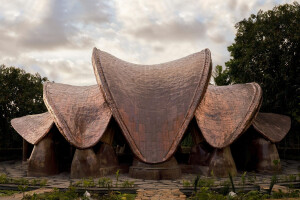 Lumi Shala by IBUKU is a sculptural bamboo-grid-shell yoga center in Bali