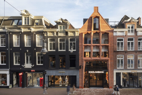 Storefront in Amsterdam by Dok architecten features sculpted facade of hand-molded bricks