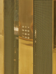 P-286 Woven Wire Mesh in bare Brass installed in the Rosenbad Building in Sweden.