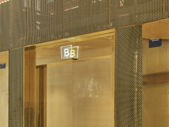 P-286 Woven Wire Mesh in bare Brass installed in the Rosenbad Building in Sweden.